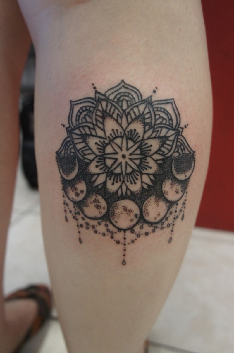 Wonderful black-ink mandala flower with moon tattoo on shin