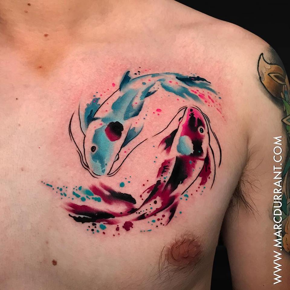 Yin yang fishes tattoo on chest