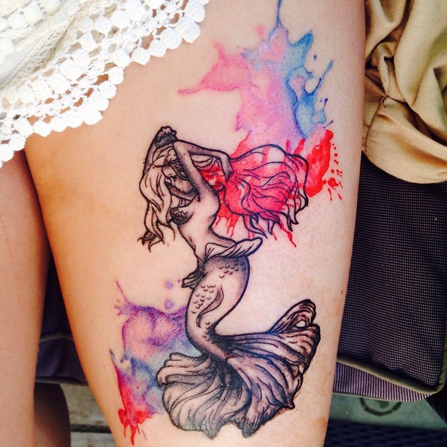 Abstract style black and white mermaid tattoo on thigh