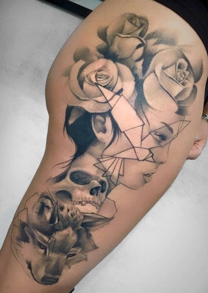 Abstract style black ink thigh tattoo of woman portrait with roses, human skull and wolf