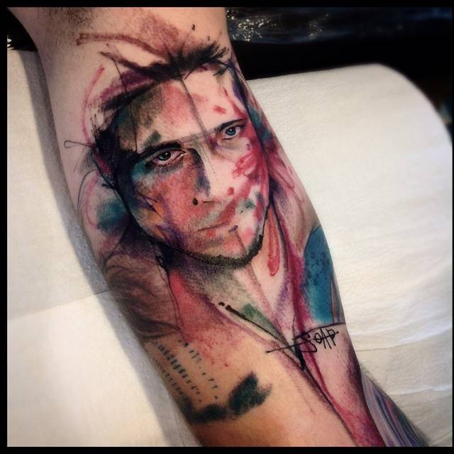 Abstract style colored arm tattoo of mana portrait