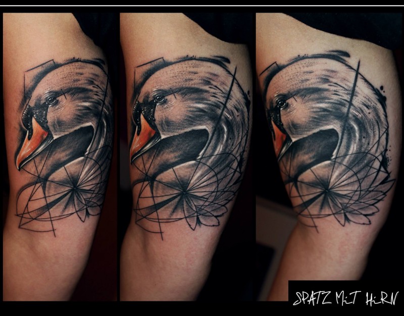 Abstract style colored biceps tattoo of big swan