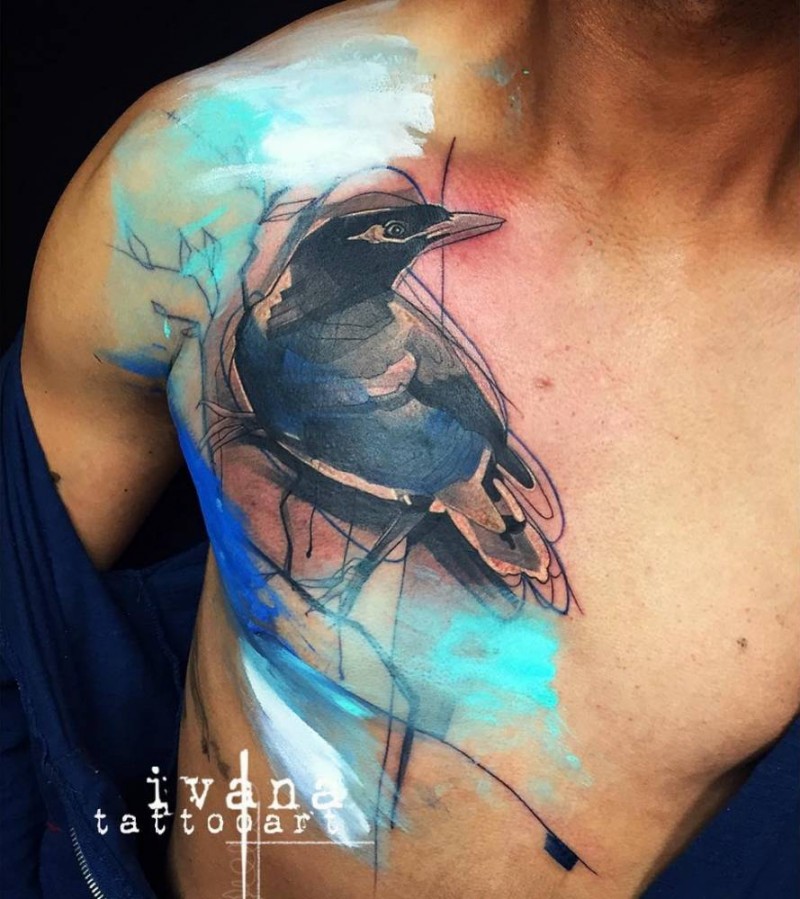 Abstract style colored chest tattoo of crow