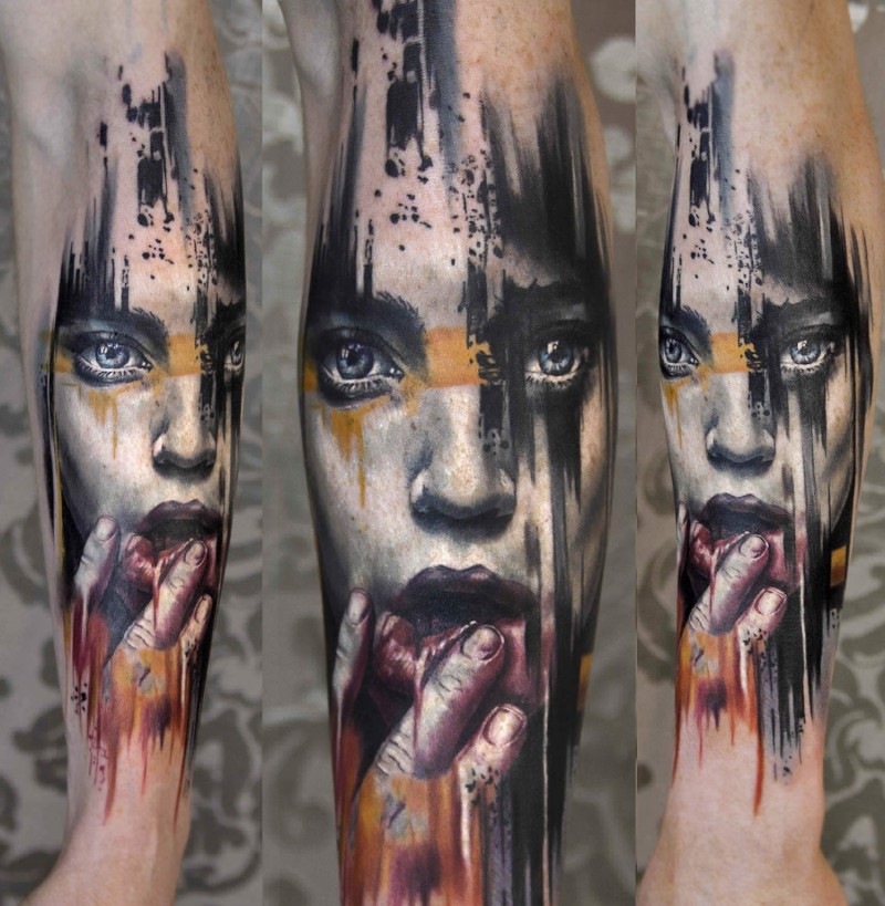 Abstract style colored forearm tattoo fo woman portrait