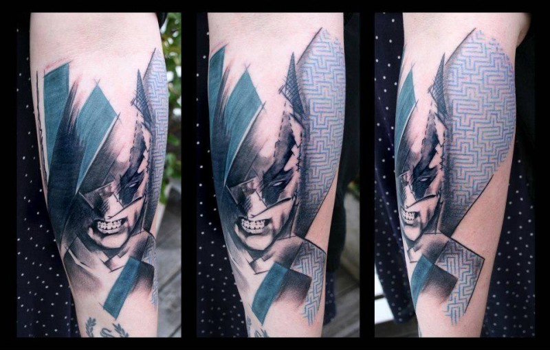 Abstract style colored forearm tattoo of Batman