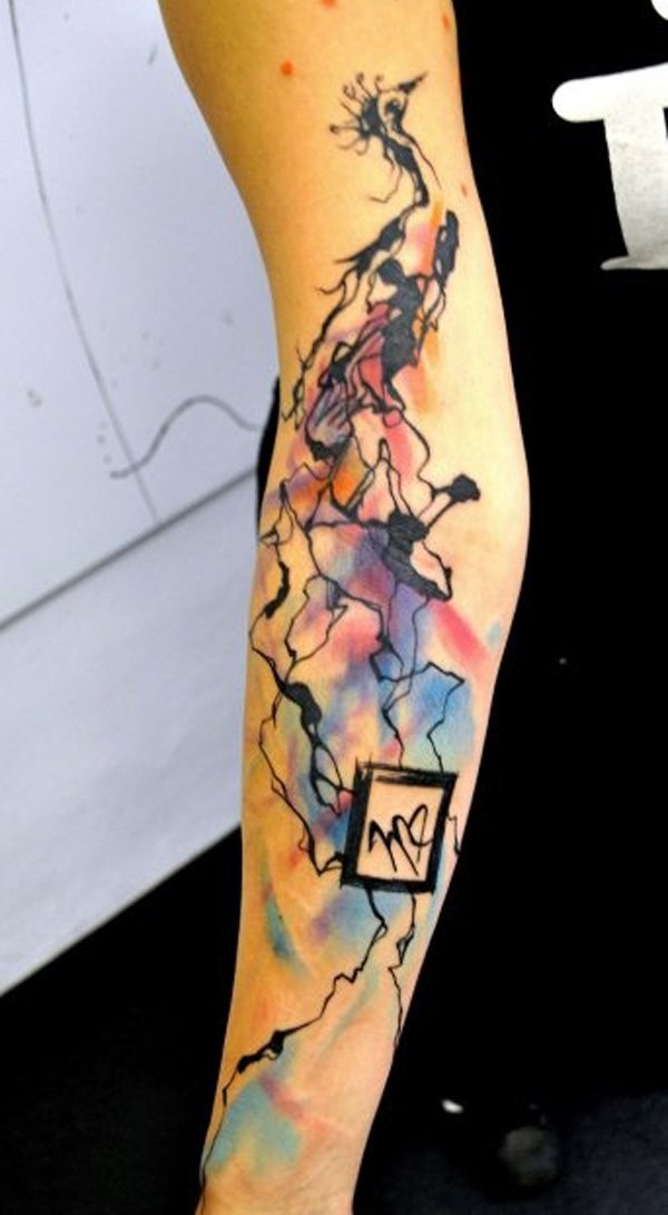 Abstract style colored half sleeve tattoo of bird shaped ornament with black square