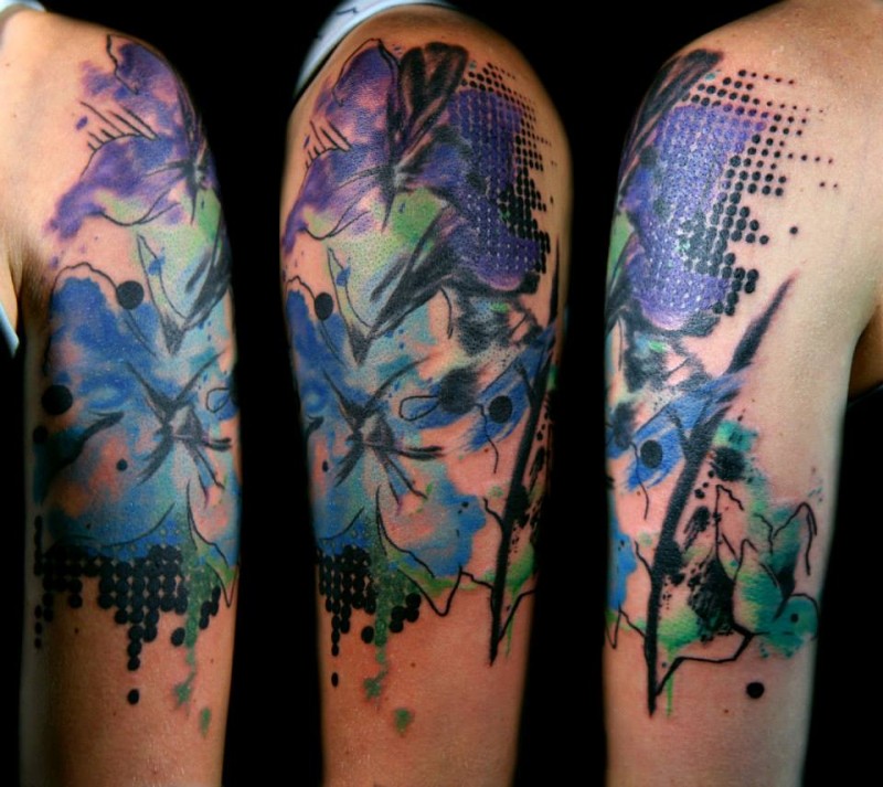 Abstract style colored shoulder tattoo of flowers and ornaments