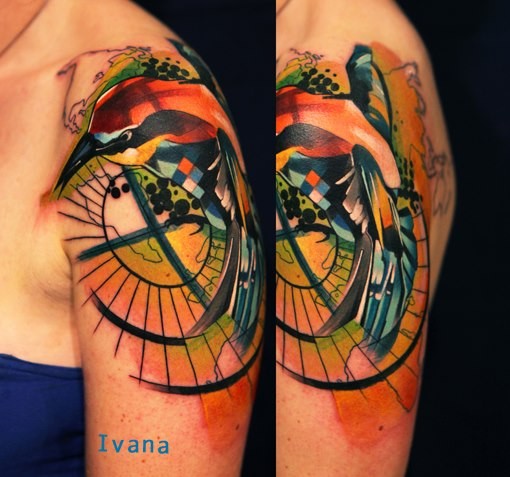 Abstract style colored shoulder tattoo of bird with ornaments