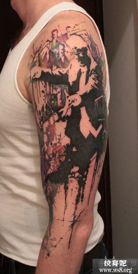 Abstract style colored shoulder tattoo of conductor