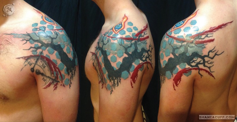 Abstract style colored shoulder tattoo of creepy ornaments