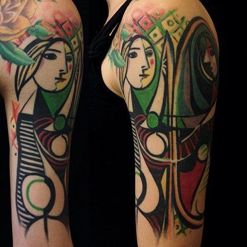Abstract style colored shoulder tattoo of woman face with ornaments