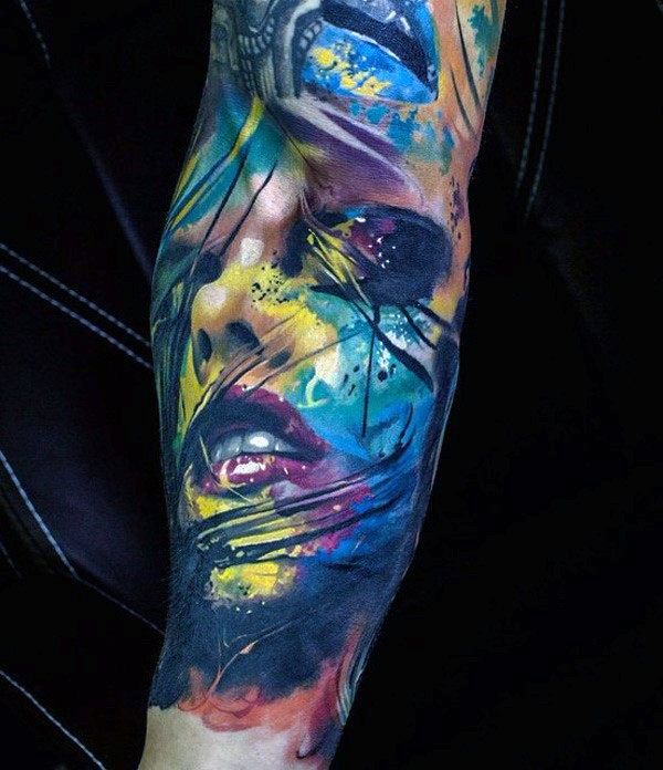 Abstract style colored sleeve tattoo of woman portrait