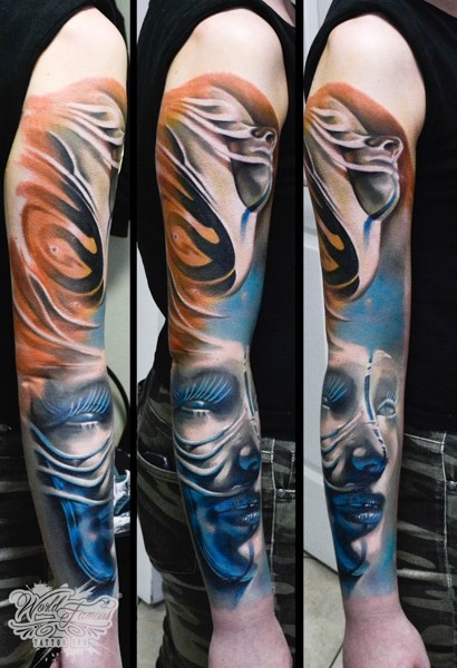 Abstract style colored sleeve tattoo of fantasy faces