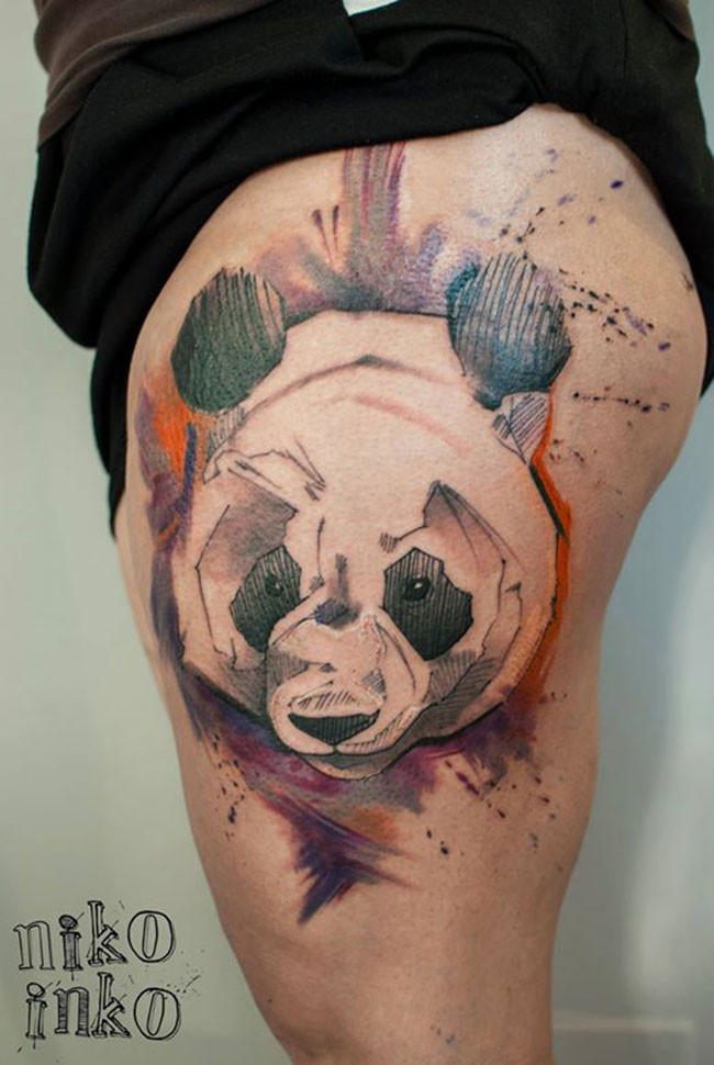 Abstract style colored thigh tattoo of panda bear