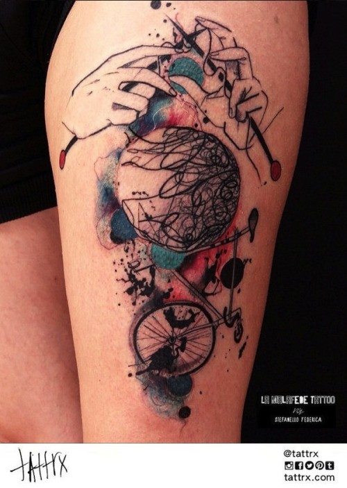 Abstract style colored thigh tattoo of bicycle combined with needles and treads