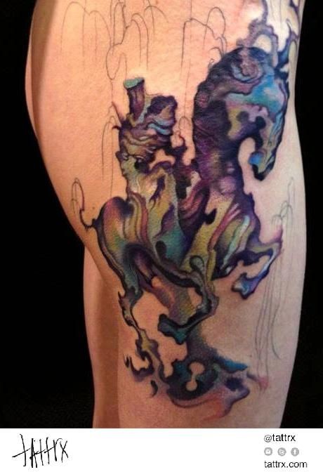 Abstract style colored thigh tattoo of horse