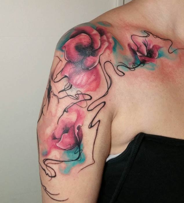 Abstract style colored various flowers tattoo on shoulder area