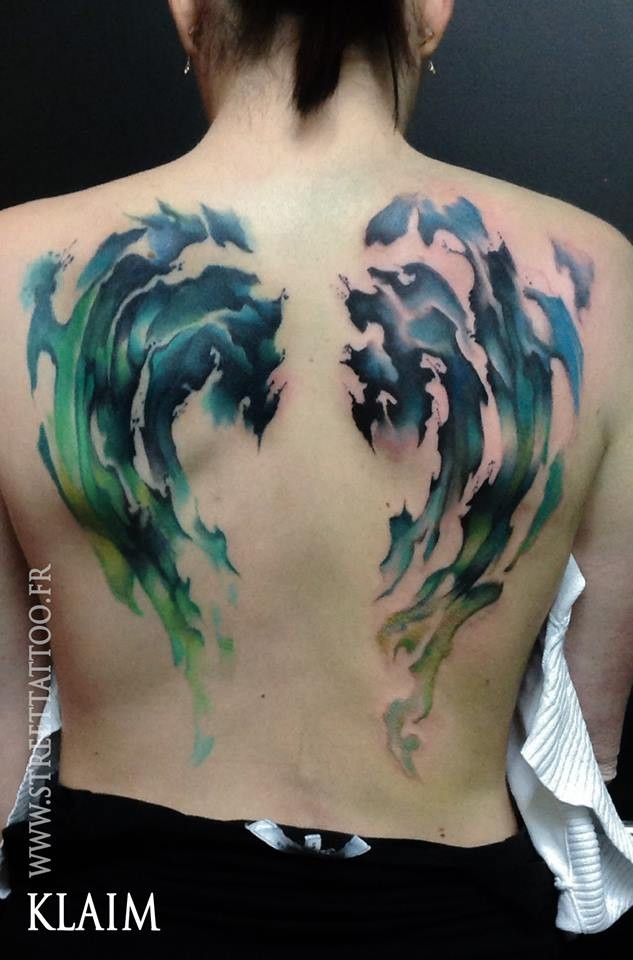 Abstract style colored whole back tattoo of mystic fog