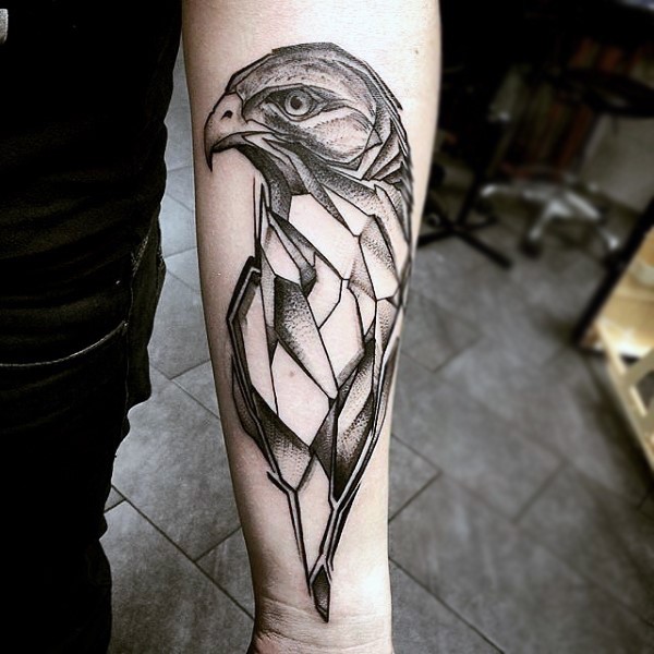 Abstract style detailed black and white eagle statue tattoo on arm