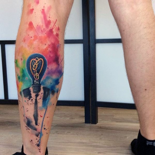 Abstract style multicolored bulb head man tattoo on leg