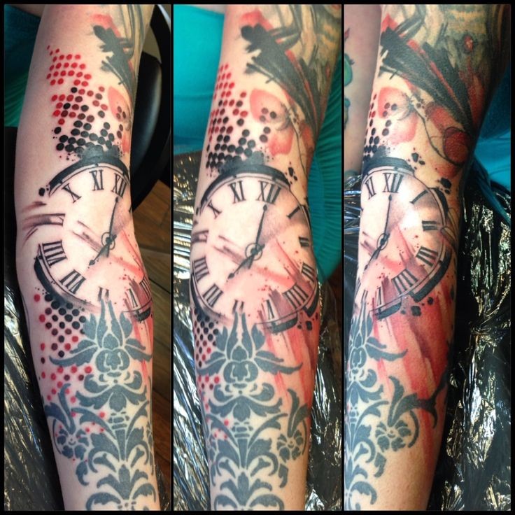 Abstract style multicolored tattoo with big old clock on sleeve