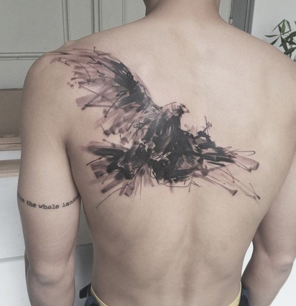 Abstract style painted big black and white eagle tattoo on back