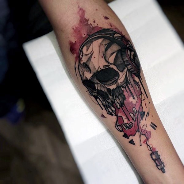Abstract style painted multicolored corrupted skull tattoo on arm