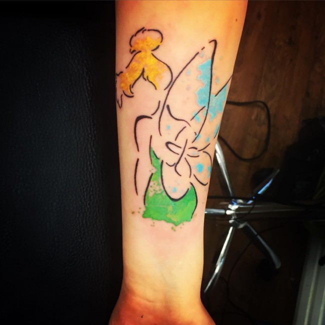 Abstract style Tinkerbell shaped forearm tattoo