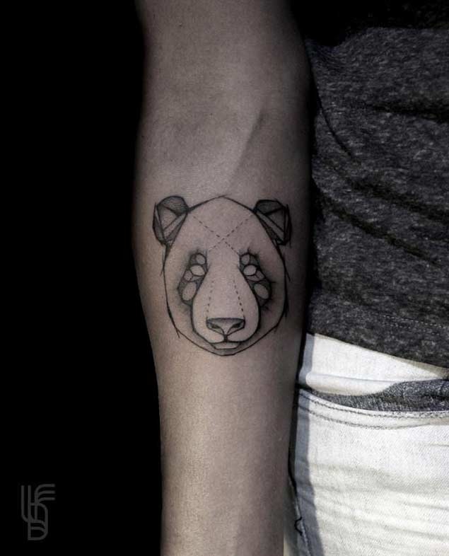 Abstract style tiny black ink forearm tattoo of panda bear head