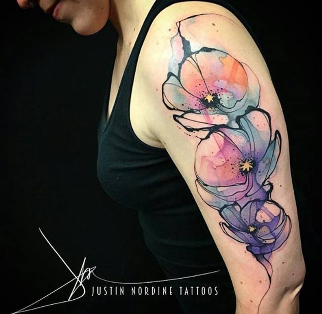 Abstract style watercolor like painted beautiful half sleeve tattoo of flowers
