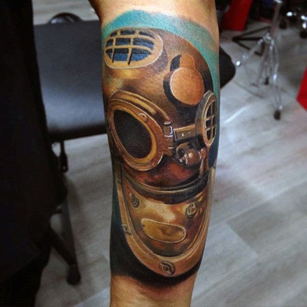 Accurate colored forearm tattoo of bronze divers helmet