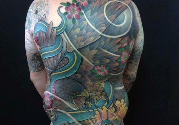 Accurate painted and colored detailed eagle tattoo on whole back