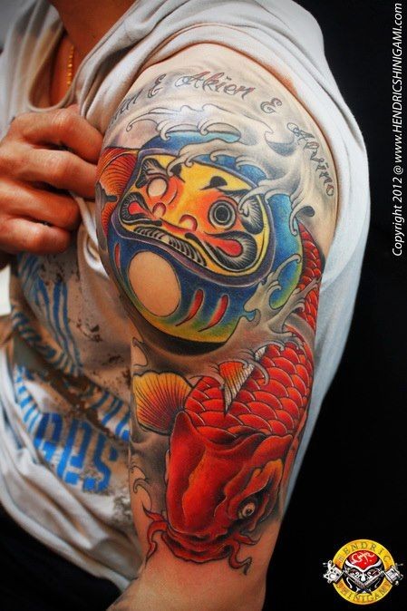 Accurate painted and colored shoulder tattoo of Asian daruma doll with carp fish