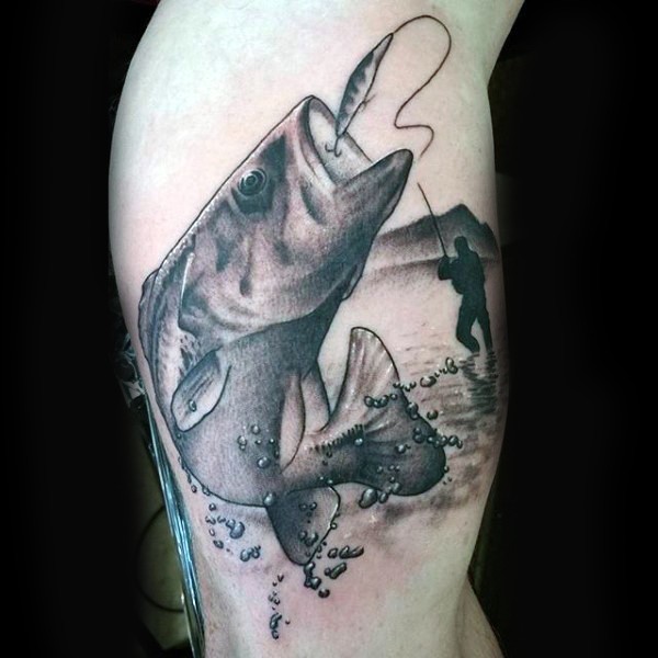 Accurate painted black and white hooked fish tattoo on arm