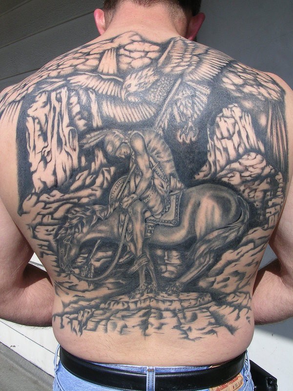 Accurate painted black and white Indian warrior tattoo on whole back with eagle