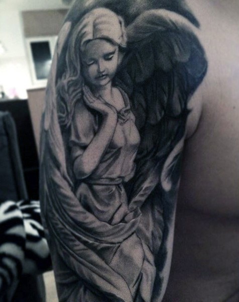 Accurate painted black and white shoulder tattoo of angel statue