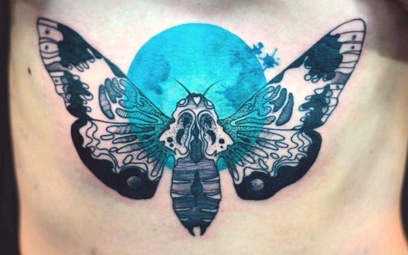 Accurate painted by Joanna Swirska tattoo of large butterfly and blue moon
