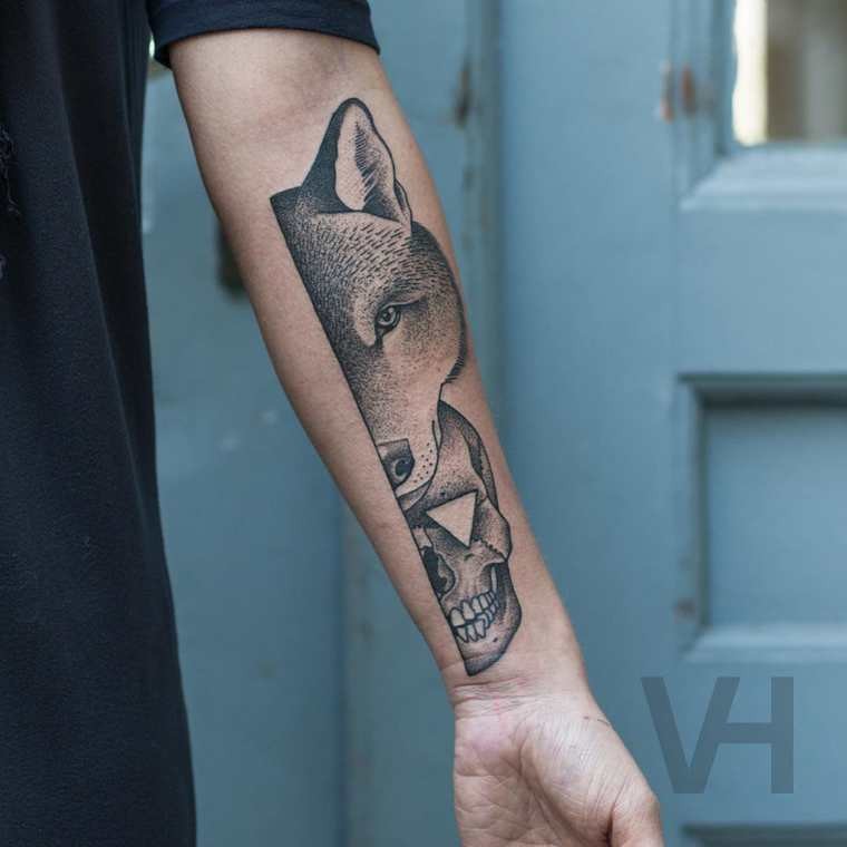 Accurate painted by Valentin Hirsch black ink forearm tattoo of fox with human skull