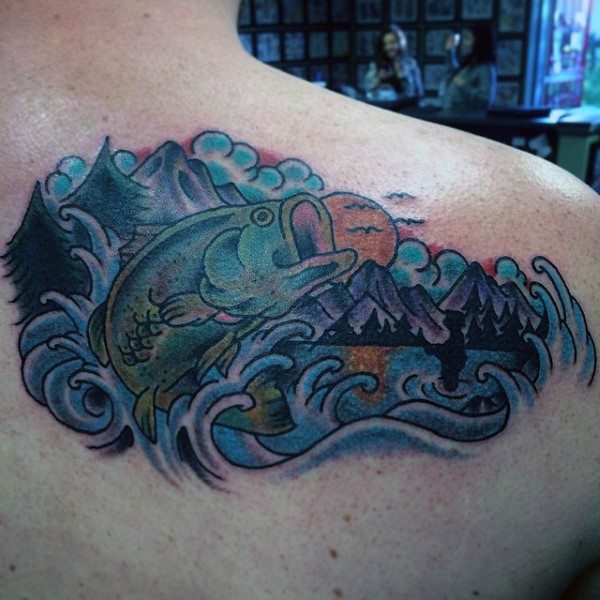 Accurate painted colored hooked fish in mountain lake tattoo on shoulder