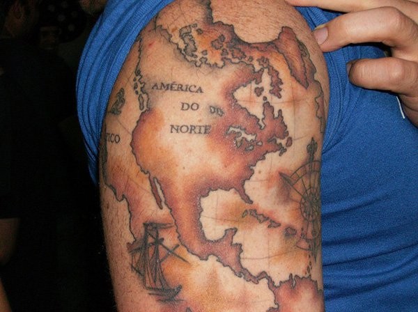 Accurate painted colored on shoulder tattoo of nautical map part