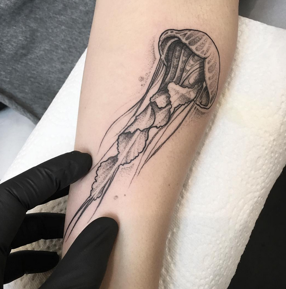 Accurate painted medium size forearm tattoo of jellyfish