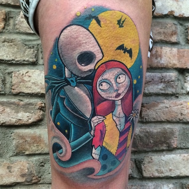 Accurate painted new school style thigh tattoo of Nightmare before Christmas cartoon couple
