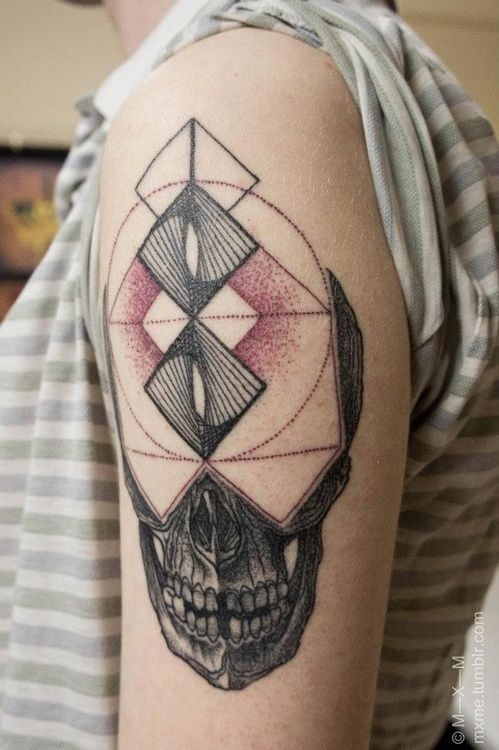 Alien like colored skull with geometrical figure tattoo on shoulder