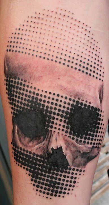 Amazing lovely halftone skull tattoo