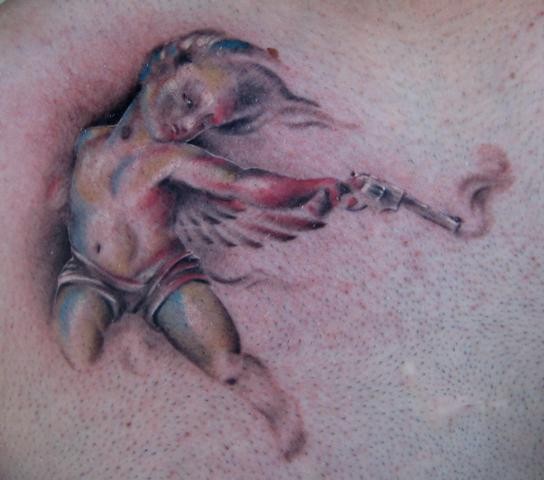 Amazing watercolor cherub with a gun tattoo