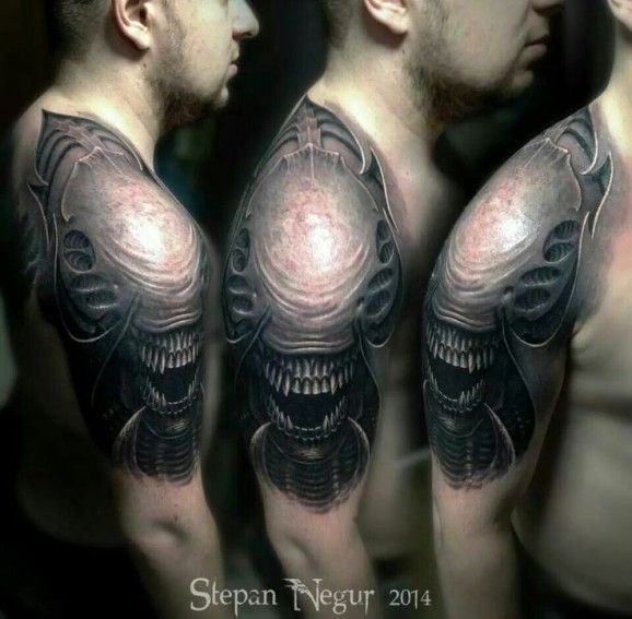 Amazing xenomorph tattoo by Stepan Negur