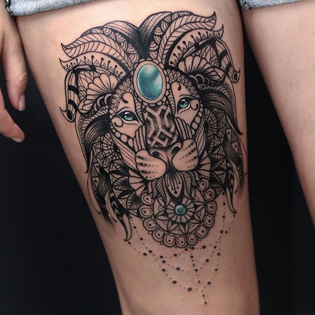 Amazing Asian style thigh tattoo of lion head with jewelry