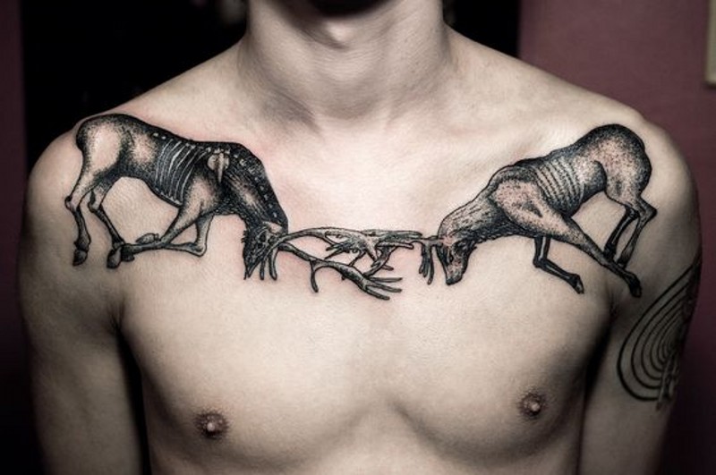 Amazing big black ink fighting deer tattoo on chest