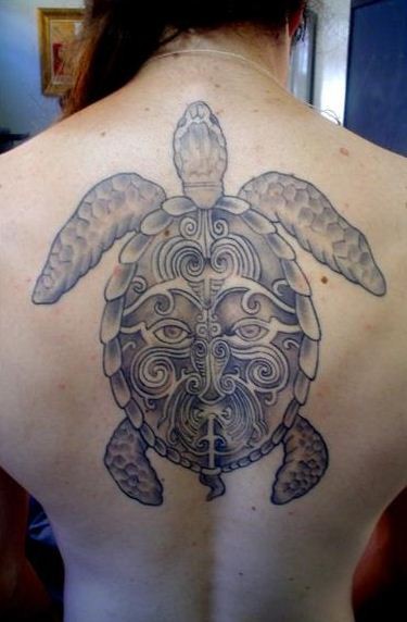 Amazing black gray maori turtle tattoo on back