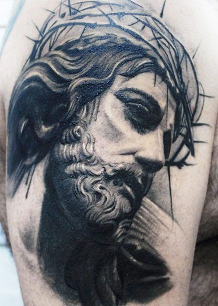 Amazing black gray portrait of jesus in a crown of thorns tattoo